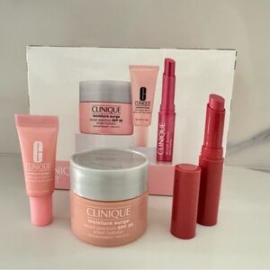 Clinique 3 piece travel set Moisture Surge & Almost lipstick Brand New